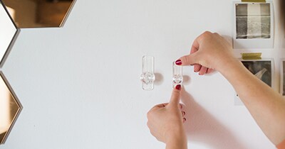 Press hooks onto wall
