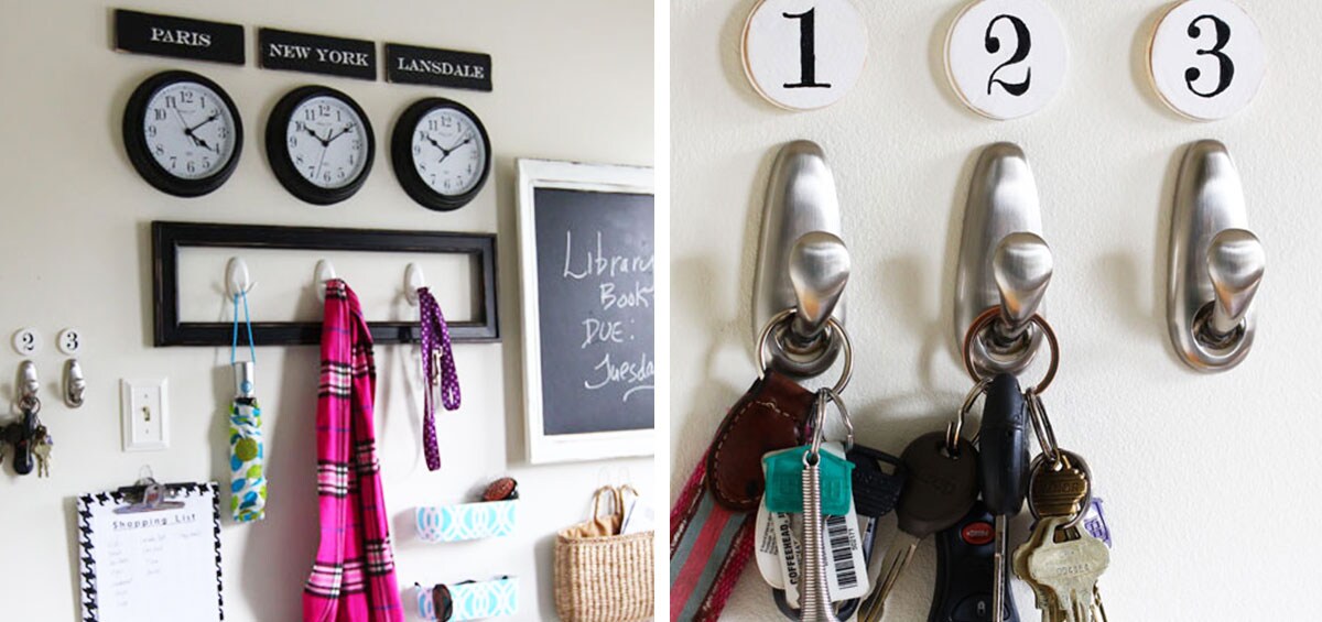 An organized mudroom with wall hooks for keys, clothing and lists along with three wall clocks displaying the time in different cities.