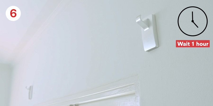 Step 6 - Slide the hook back on, Wait 1 hour for adhesive to build.