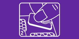 Pulling hook from sheet and placing on wall.
