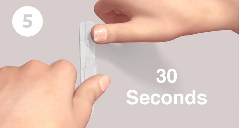 Step 5 - To ensure adhesive hold, temporarily remove frame from wall to reinforce strips. Peel frame as shown. Press each strip on wall for 30 sec.

