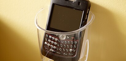 Use a Command™ Recharging Station to hold your cellphone while it is charging
