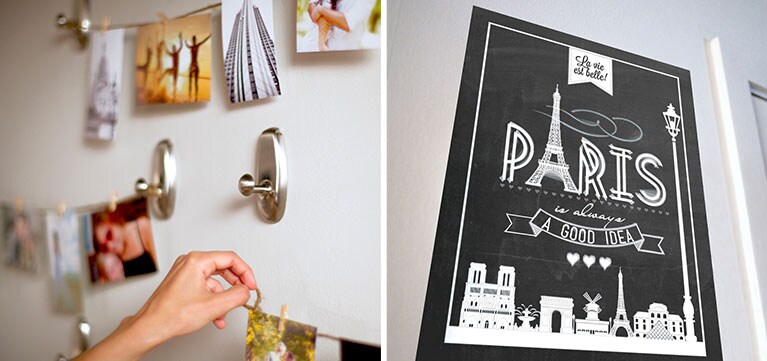Hanging photo banners and a paris themed poster.