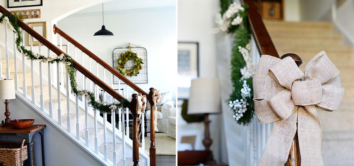 Staircase decorated with garland and bows using Command™ clear mini hooks and cord clips.