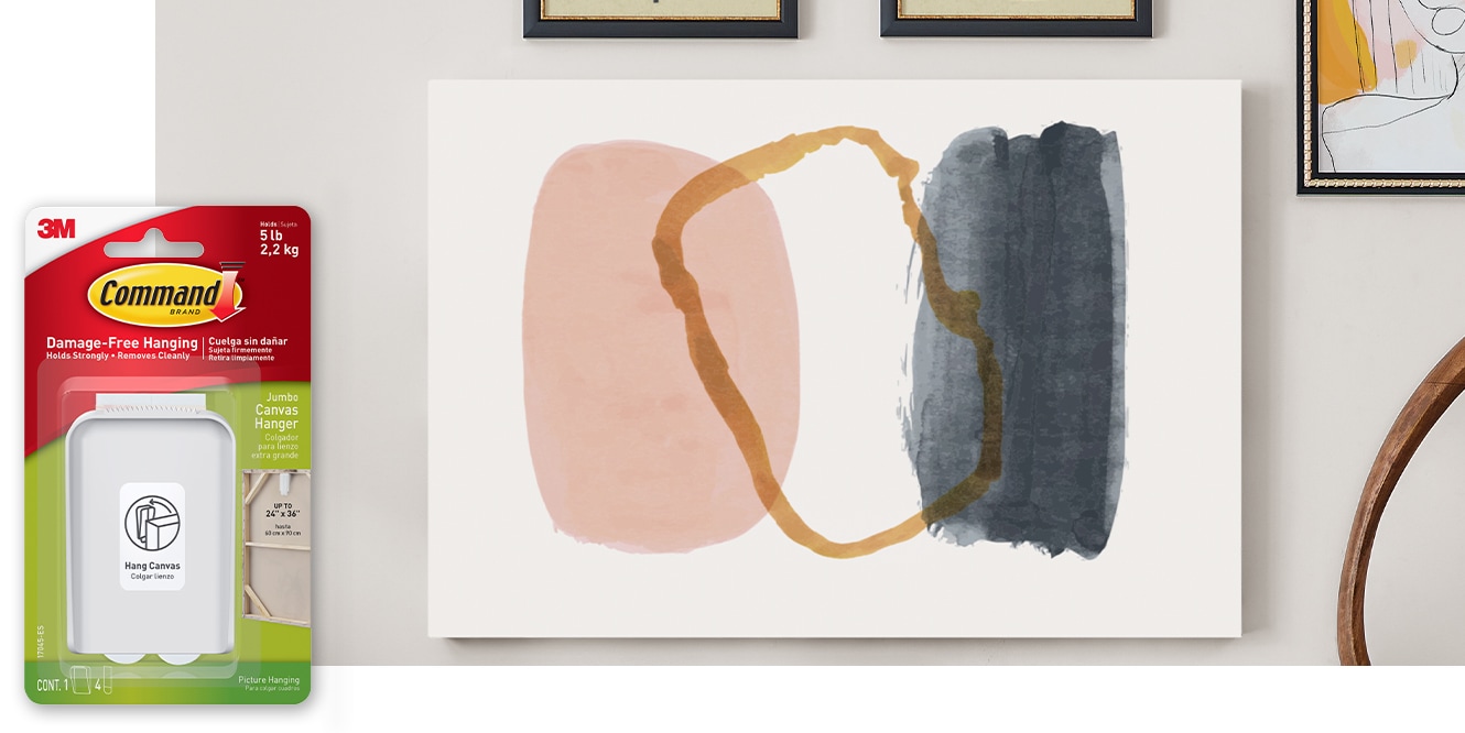 An abstract canvas art piece hung on the wall using a Command™ Jumbo Canvas Picture Hanger.

