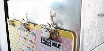 Dress up clipboards with scrapbook paper or decorative duct tapes
