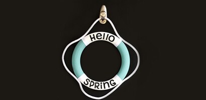 Following package instructions, adhere a Command™ Outdoor Forever Classic Brushed Nickel Hook to the front of the door to hang your spring wreath
