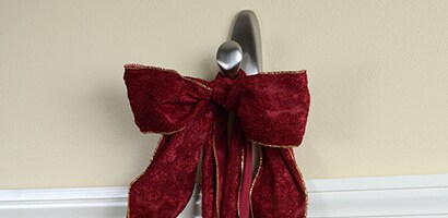 Hang the mistletoe ball on the Command™ Timeless Brushed Nickel Finish Large Hook
