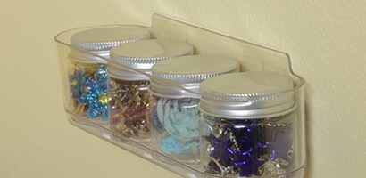 Use Command™ Clear Medium and Large Caddies to hold stamp pads, scissors and embellishments.
