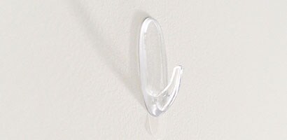 Clear Command™ Hook applied to a white wall.
