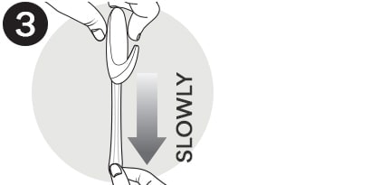 Step 3: Stretch the strip slowly against the wall (at least 12 inches) to release.
