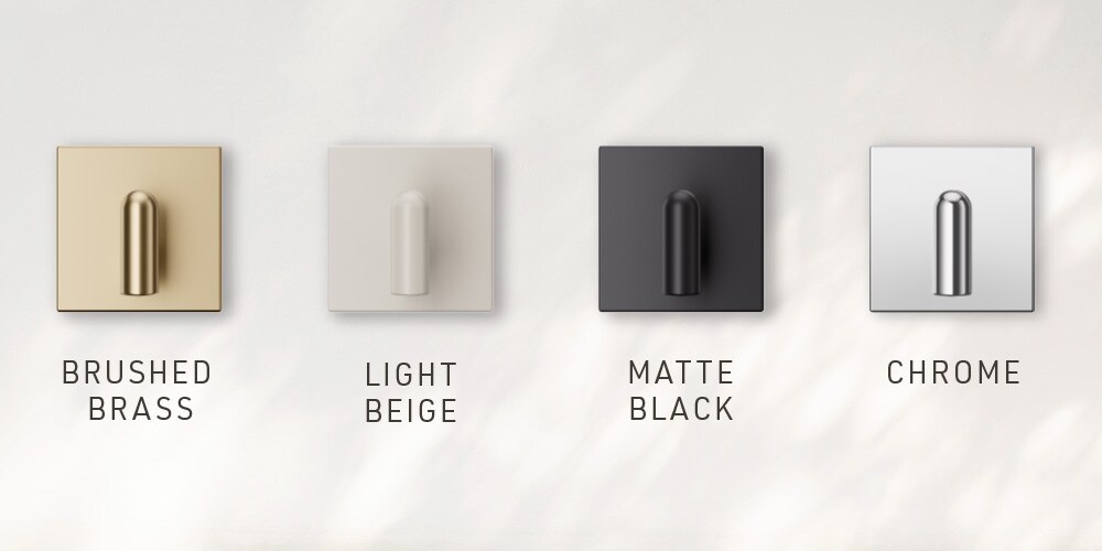Command™ Décor small metal hook available in four finishes: Brushed Brass, Light Beige, Matte Black, and Chrome.
