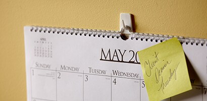 Eliminate a cluttered desk space by hanging things up on the wall
