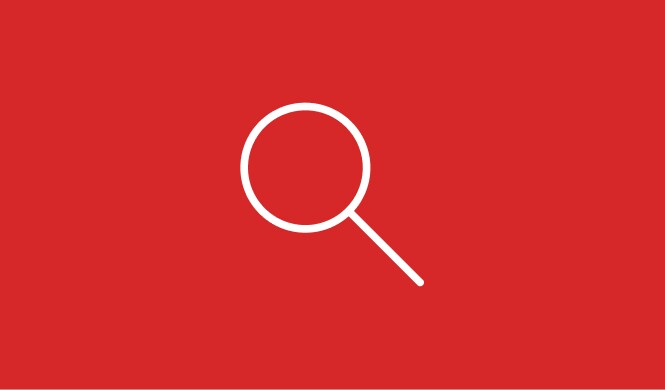 White magnifying glass icon on a red background.
