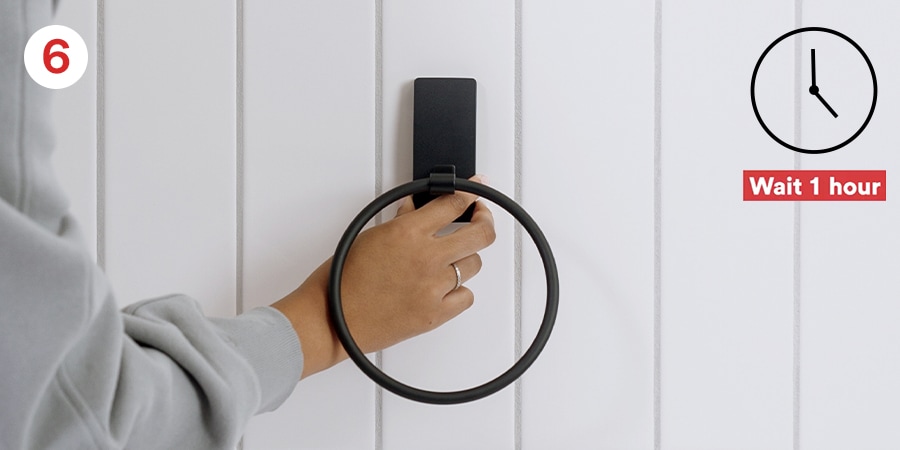 Step 6 - Slide hook back onto base, wait 1 hour for adhesive to build.