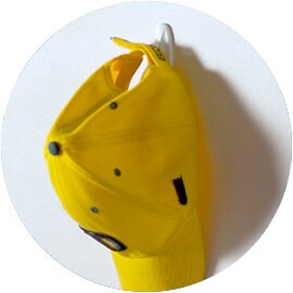 Cap hanging on a wall.
