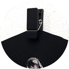 Command Slate Spring Clip securing a cutout graduation hat.
